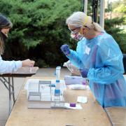 Student doing spit test 