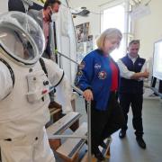 NASA's Pam Melroy tours an aerospace engineering lab on the CU Boulder campus