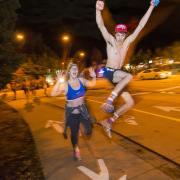 Students run in the 2015 Nearly Naked Mile