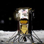 Illustration of lunar lander on the moon's surface