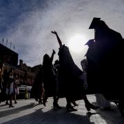 students graduating at Folsom Field