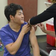 Student receives a free flu shot