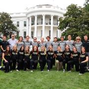 The CU Ski team stands in front of the White House during a visit to honor the team.