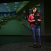 Presenter gives Ed Talk on stage
