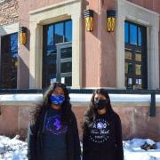 T9Hacks student organizers Océane Andréis and Neha Kunapuli in front of the ATLAS building