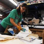  Woman going through paper