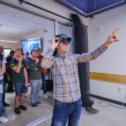 Hooman Hedayati starts up VR technology that presents a view from a drone during the ATLAS Research Showcase. Photo by Glenn Asakawa.