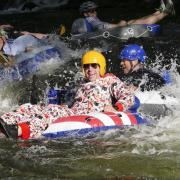 Tubers ride the Boulder Creek for Tube to Work Day 2018