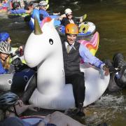 Tubers ride the Boulder Creek for Tube to Work Day 2018