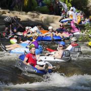 Tubers ride the Boulder Creek for Tube to Work Day 2018