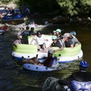 Tubers ride the Boulder Creek for Tube to Work Day 2018