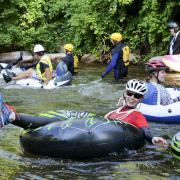 Tubers ride the Boulder Creek for Tube to Work Day 2018