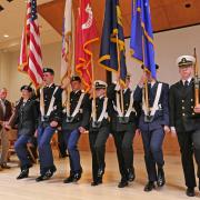 The Joint ROTC Color Guard presents during the Veterans Day Ceremony in the University Memorial Center. Photo by Casey A. Cass.