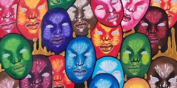 A painting of multi-colored face masks