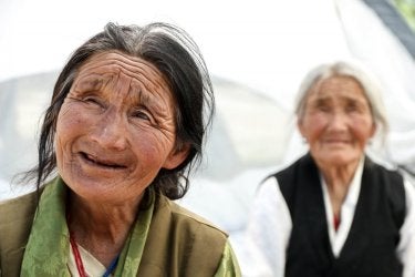 A photo of two elderly Indian women