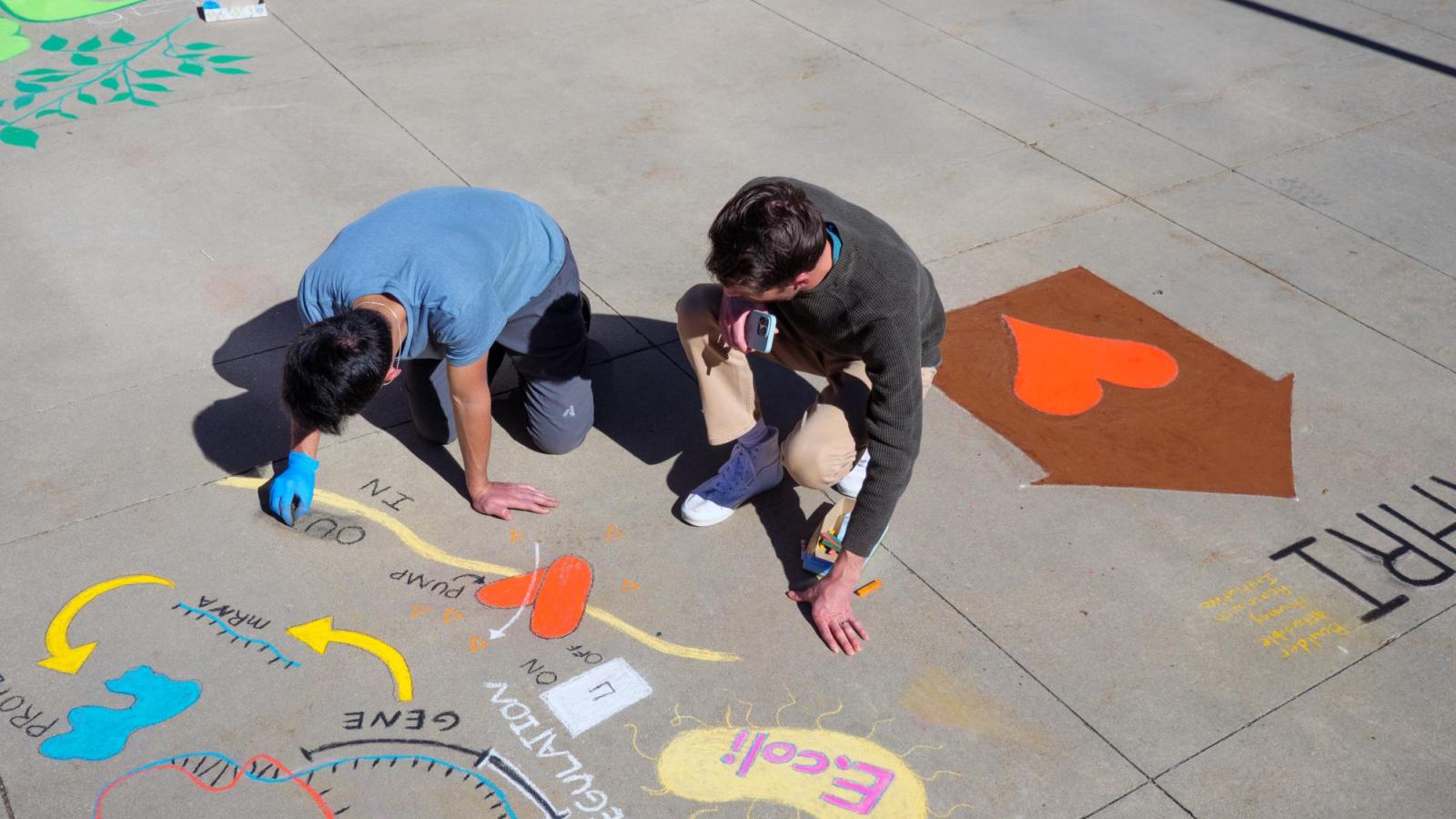 Students creating chalk art