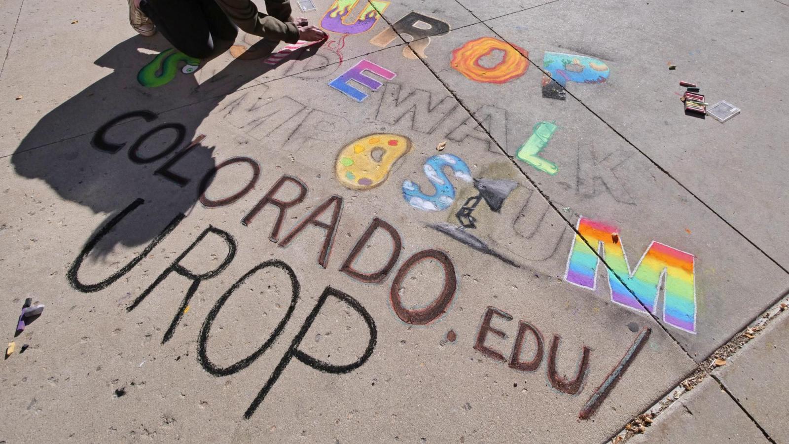 Students creating chalk art