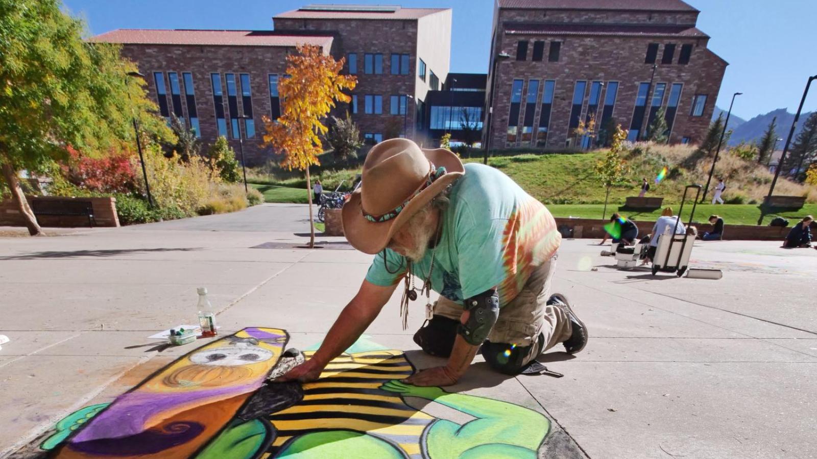 Students creating chalk art