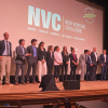People stand on a stage